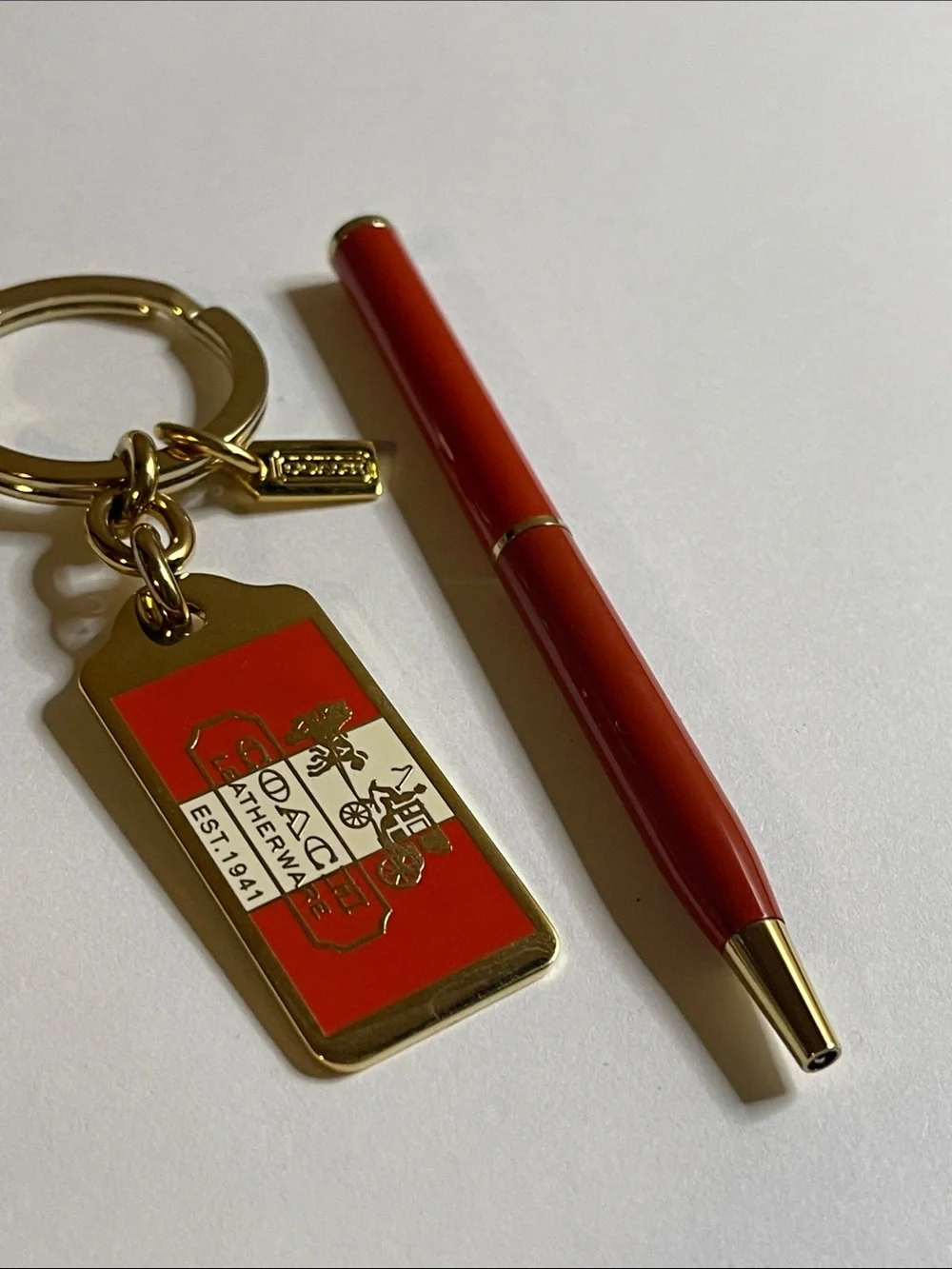 Coach Red and Gold Enamel Keychain Tag with Coach Pen